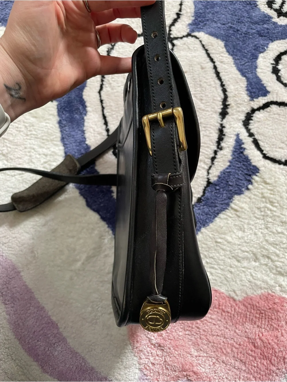Dooney & Bourke vintage black leather crossbody bag solid brass medallion 1980s?